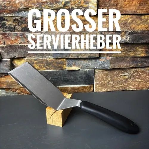 Großer Servierheber aus Metall mit schwarzem Plastik Griff